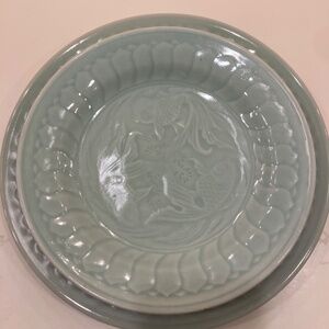 Fish pottery plates, similar design but different sizes